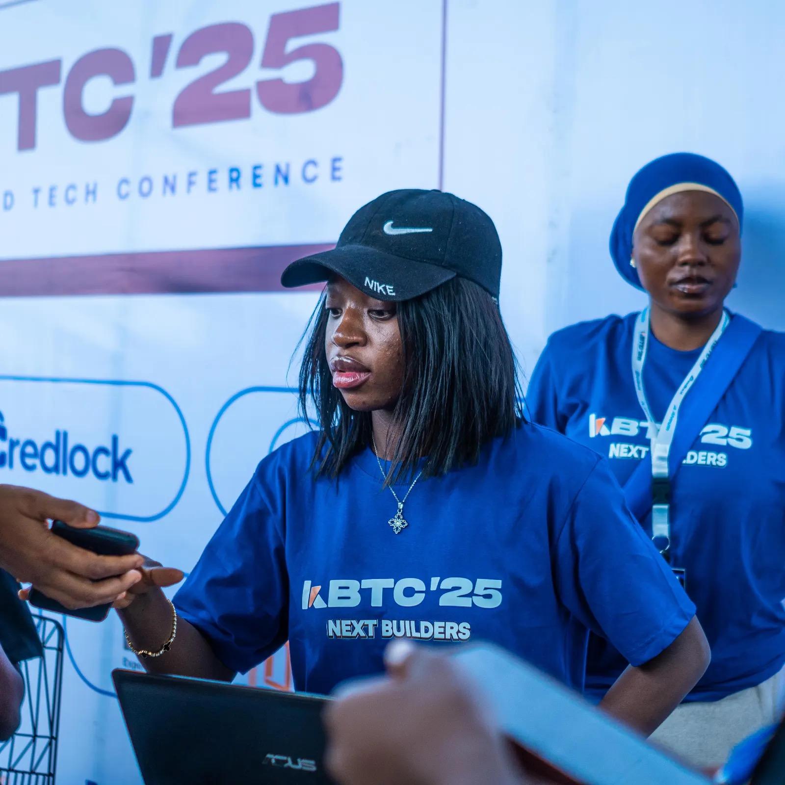Kwarabuild participant at the KBTC25 conference backdrop